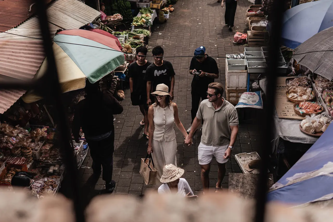 Guests walking through a traditional Balinese market
